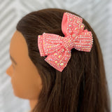 Bejeweled pink hair bow