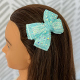 Bejeweled aqua hair bow