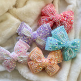 Bejeweled pink hair bow